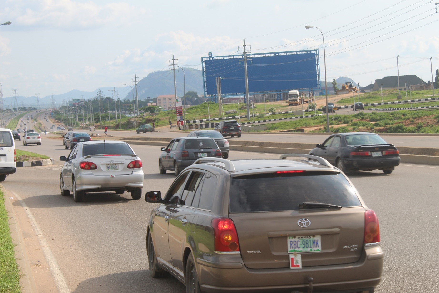 Megaboard @ ALONG AIRPORT ROAD BY ASO SAVINGS ESTATE JUNCTION FTT AIRPORT — Abuja